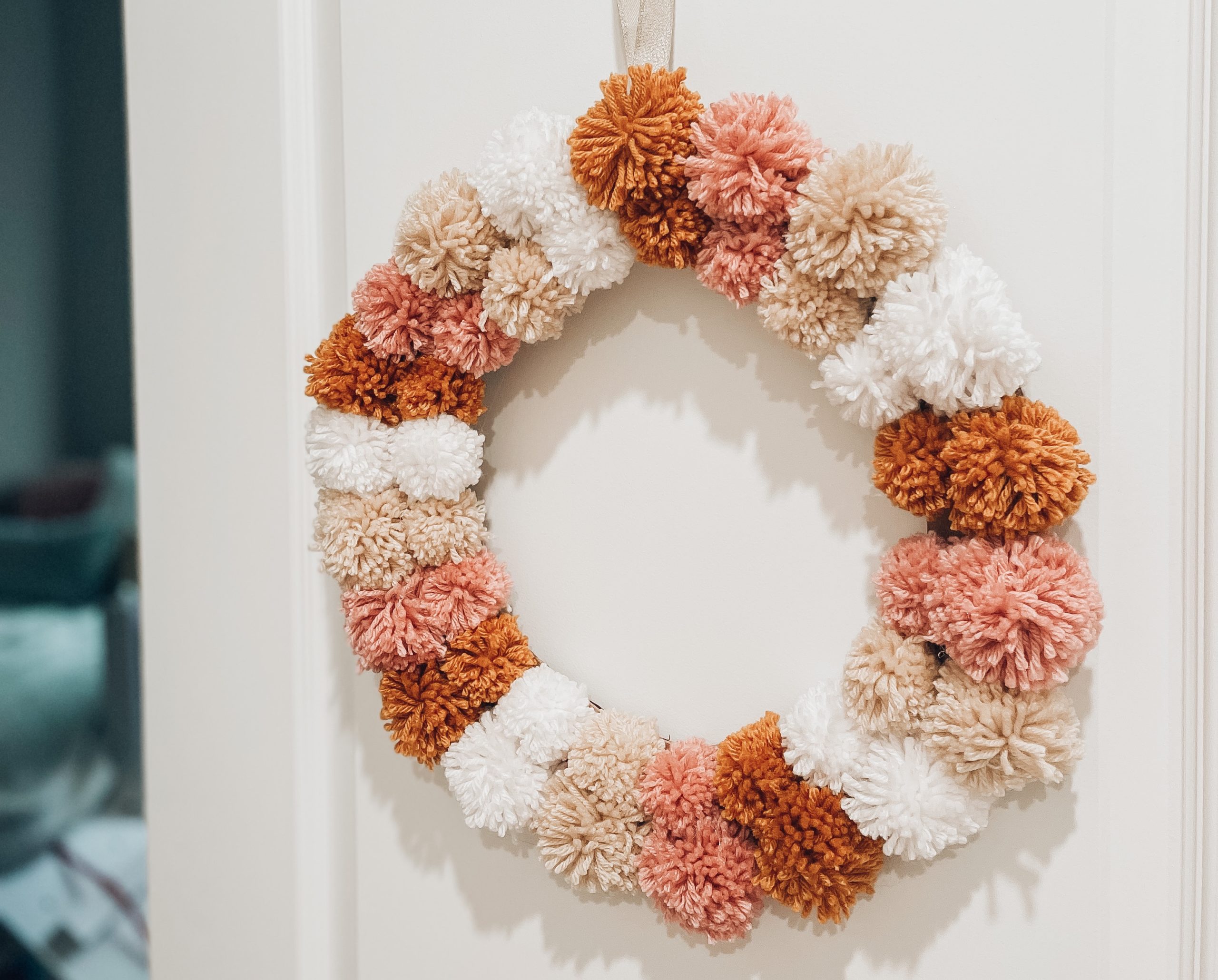 how to make a pom-pom wreath